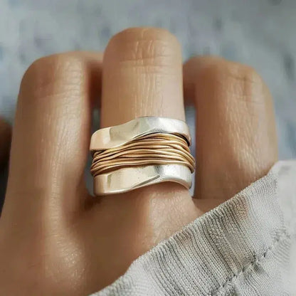 Zilveren ring met gouden draden