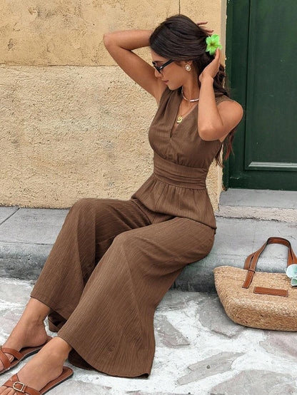 Marga | Effen jumpsuit met diepe V-hals en gerimpelde mouwen