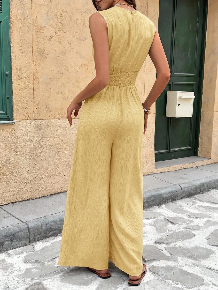 Marga | Effen jumpsuit met diepe V-hals en gerimpelde mouwen