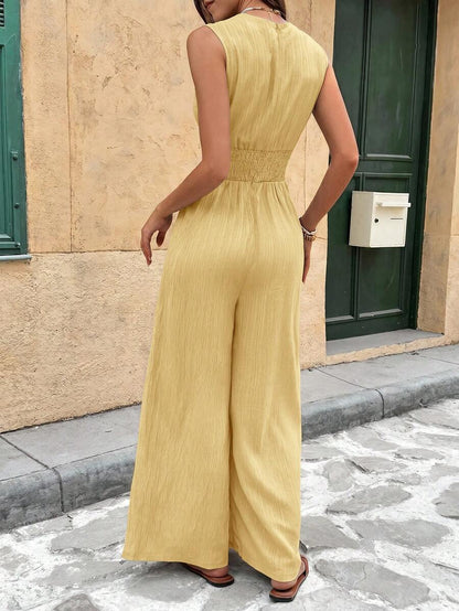 Marga | Effen jumpsuit met diepe V-hals en gerimpelde mouwen