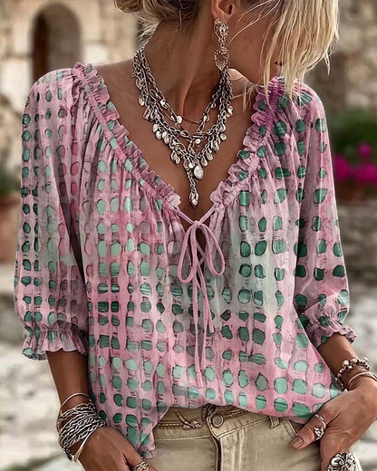 Lena | Blouse met stippenpatroon en vetersluiting