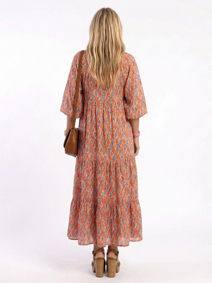 Amara | Midi jurk met V-hals en geometrisch patroon
