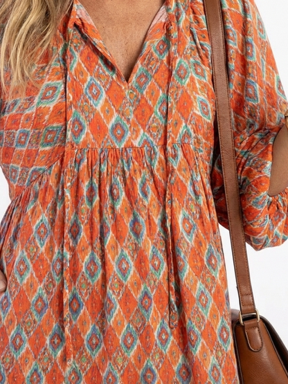 Amara | Midi jurk met V-hals en geometrisch patroon
