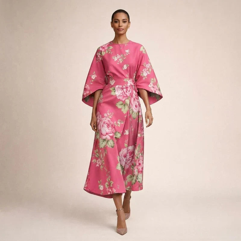 CLEMENTINE | Florale Midi met sculptuur taille en luchtige elegantie
