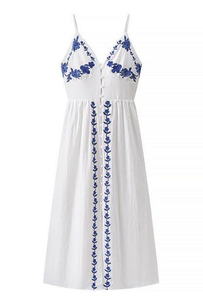Thalina - Knielange Zomerjurk met blauwe borduurdetails