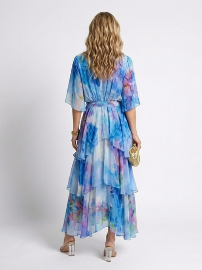 Calista | Maxi jurk van transparant materiaal met V-hals en gestrikte taille