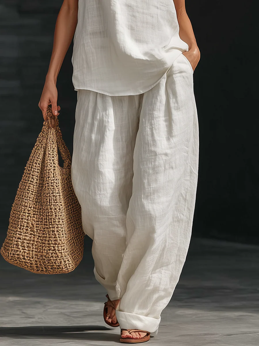 Zoë™ – Mouwloos ensemble en brede broek