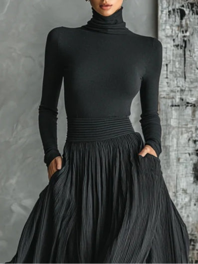 Evy -- Elegante set met plissé rok