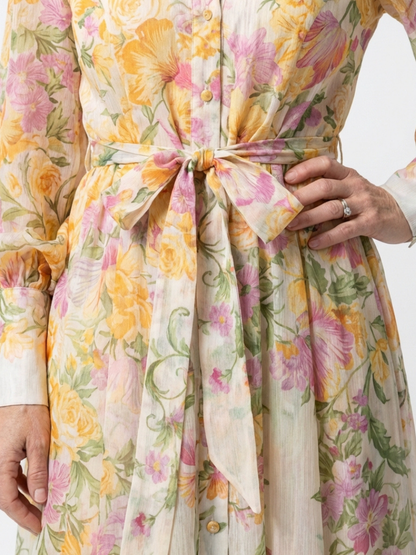 Cressida | Maxidress met bloemenprint en transparante stof met lange mouwen